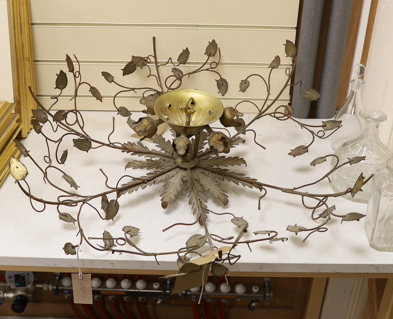 A gilt metal ceiling light